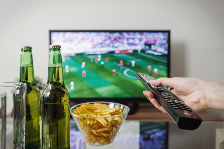 A TV, beer, and potato chips.