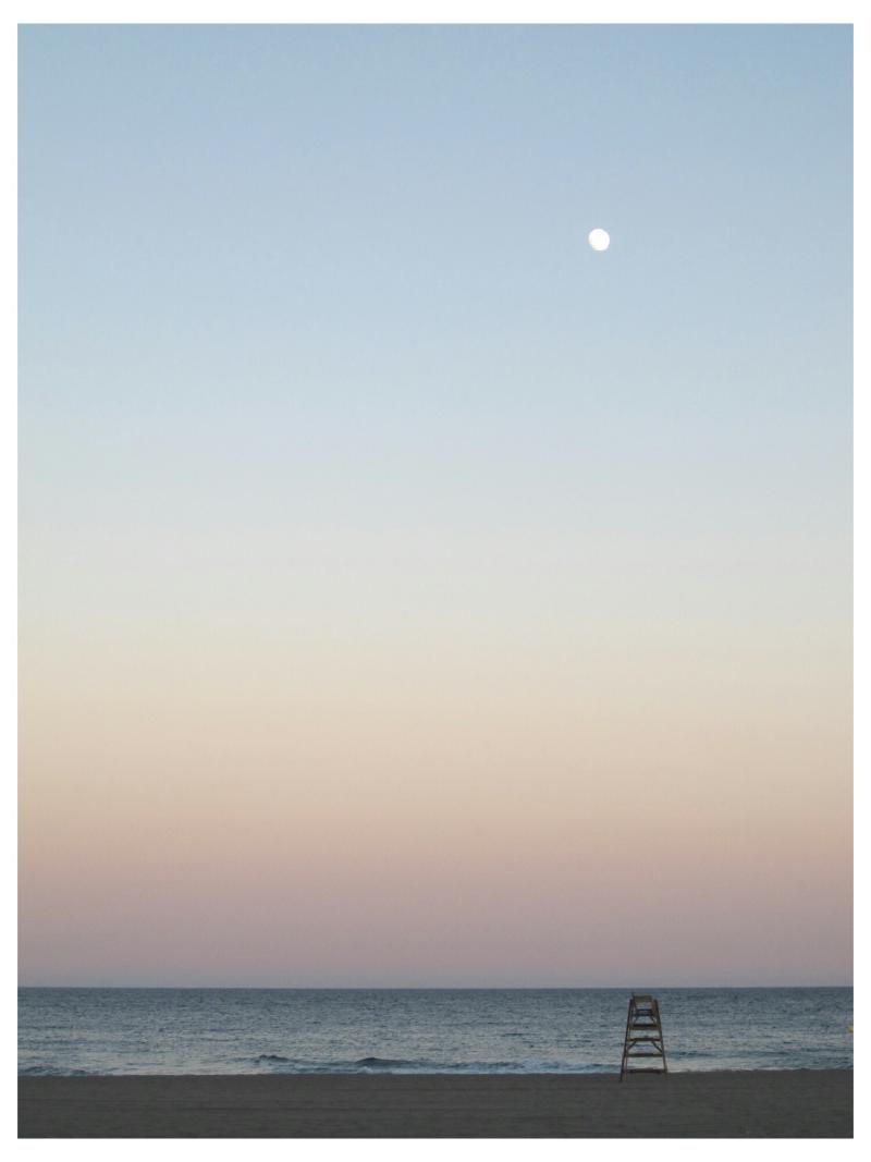 Sunset and the moon at Aurora Beach.