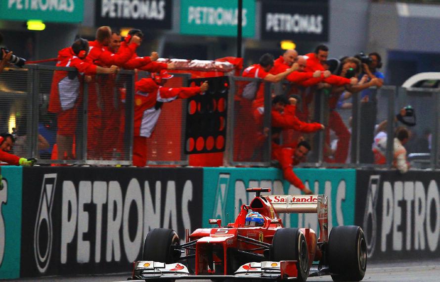 Race winner Fernando Alonso (ESP) Ferrari F2012 crosses the line. Formula One World Championship, Rd 2, Malaysian Grand Prix, Race, Sepang, Malaysia, Sunday, 25 March 2012. © Sutton Images. No reproduction without permission.