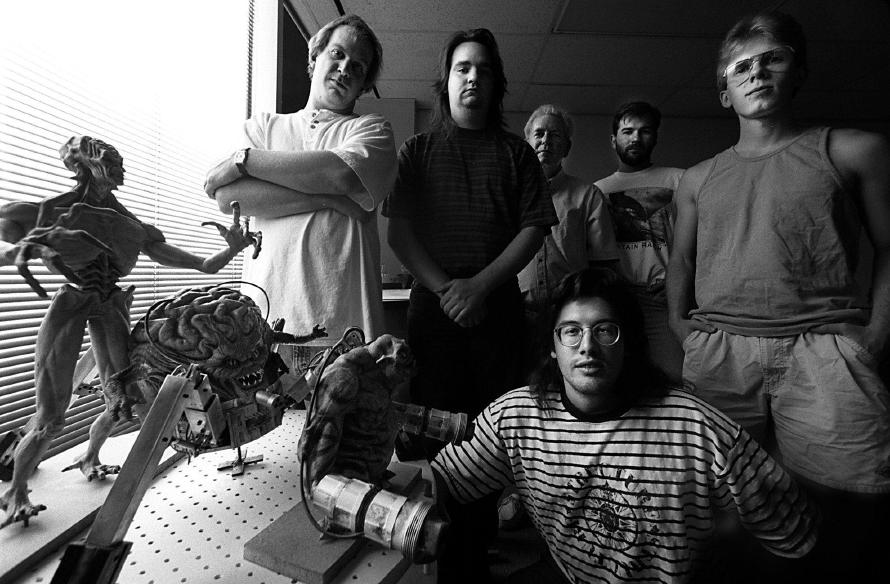 John Romero describes this picture: "This pic was taken for an interview in 1994 while making DOOM II. Jay, Adrian, Bobby, Kevin, John, me in front."