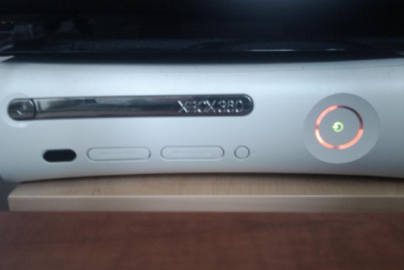 An Xbox 360 showing the infamous red rings of death.