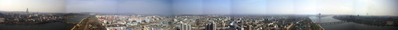 A 360 degree panorama taken from the Juche Tower. To get a better view, you should save the image to your computer and zoom in a little. The bridge to the left is not destroyed by the way, it just turned out that way because I didn’t take enough pictures.